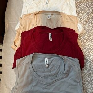 Lot of 4 XS yoga tops